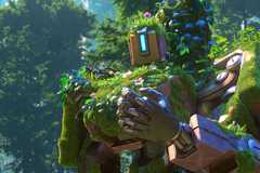 Bastion from Overwatch 2 covered in moss and little plants, looking down at his hand.