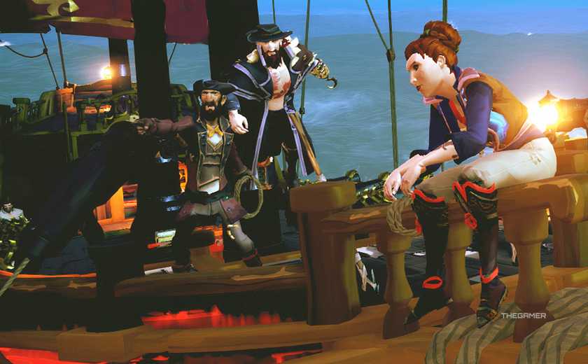 Four pirates on the open sea in a ship at night.